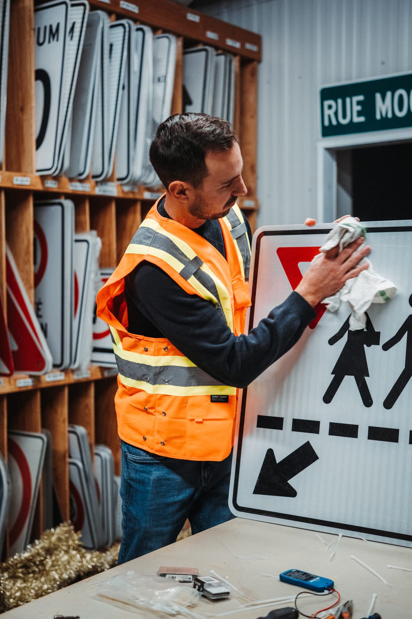 Municipal employee preparing traffic signage